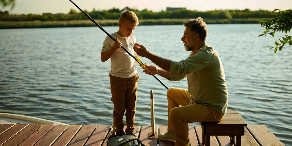 Quiet Millionaire grandfather fishing because his financial planning and tax planning are not on his mind