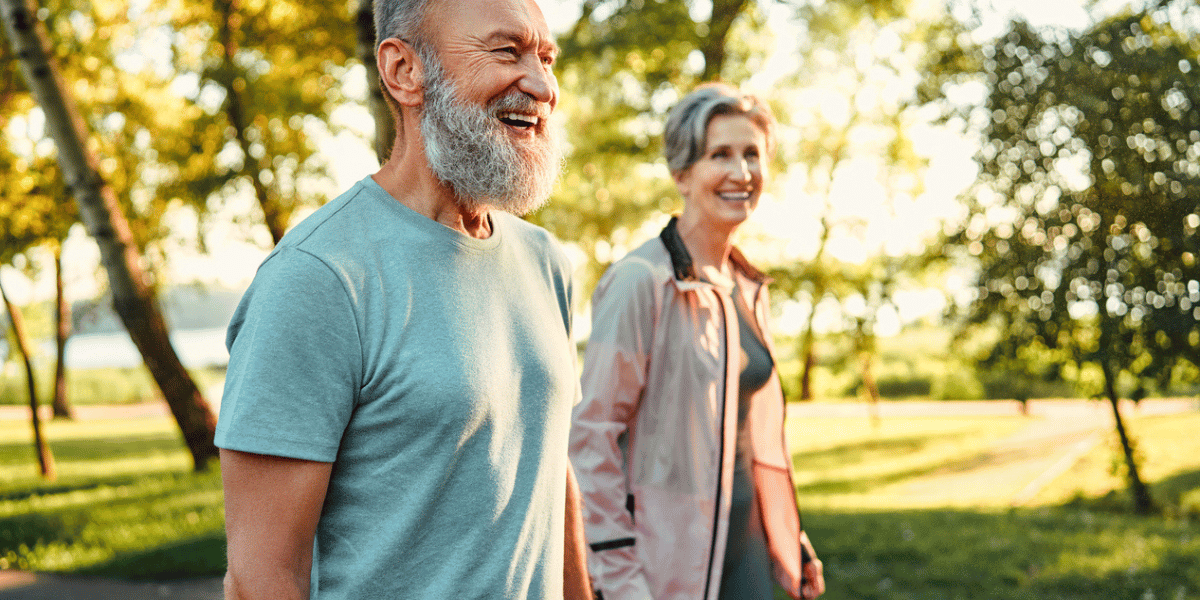 inflation and retirement planning go hand in hand, couple enjoying walk outside with peace of mind being sachetta clients