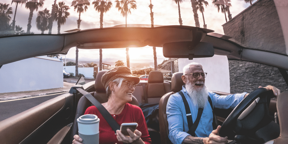 Trendy happy senior retired couple moves to sunny Florida from MA to enjoy their retirement years 