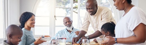 wealth management for business owners eating dinner together